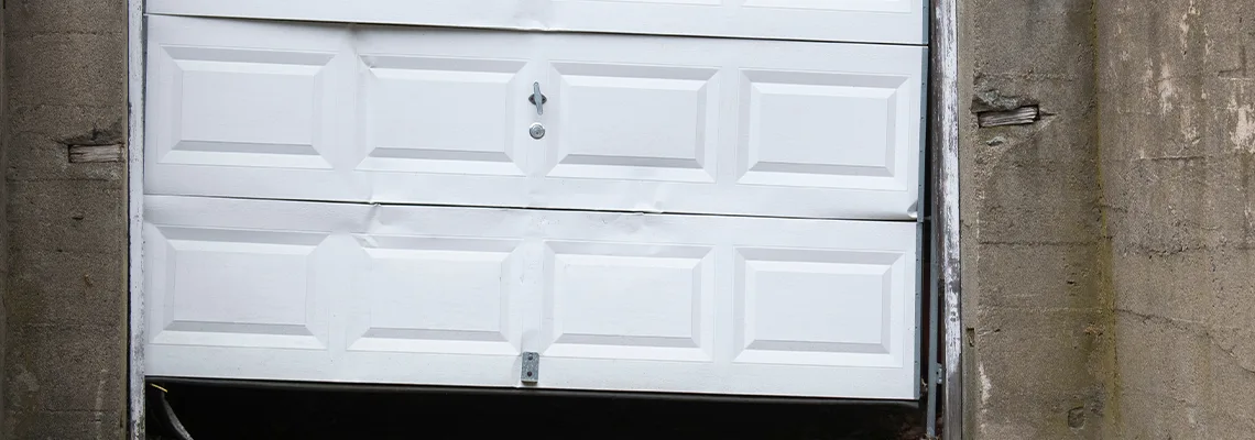 Garage Door Got Hit By A Car Dent Removal in Batavia, IL