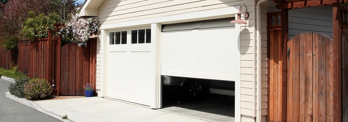 Fix Metal Garage Door Jerking in Batavia, Illinois